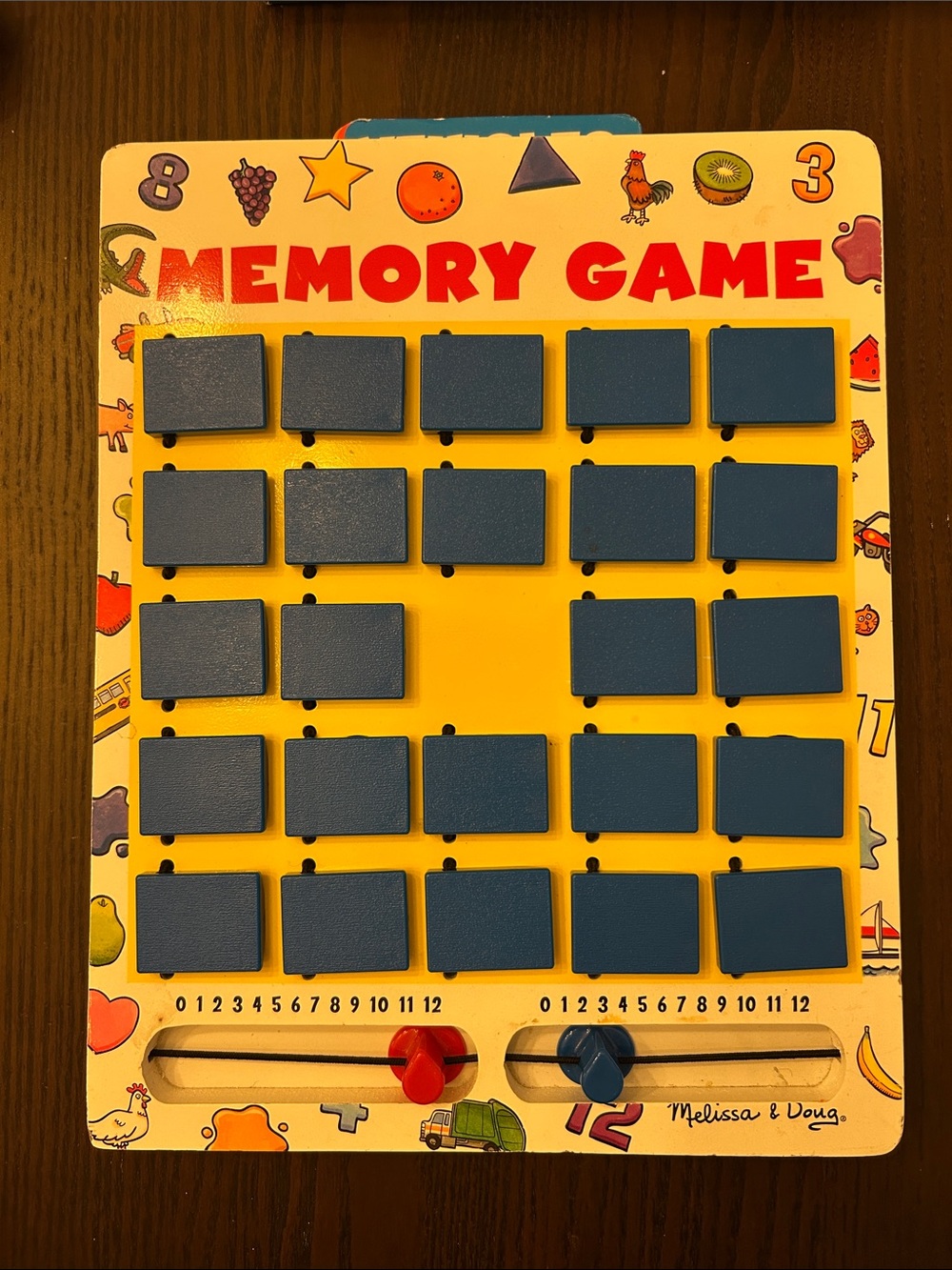 Melissa & Doug Blue Tile Memory Game on Yellow Board